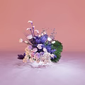 Elegant Floral Display with Purple White Pink Flowers and Green Leaves on Pink Background