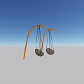 Outdoor Children's Playground With Two Orange Arc Swings And Circular Seats