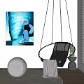Black Hanging Chair In Indoor Living Room With Wall Painting Round Cushion Vase And Blanket