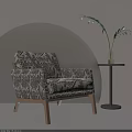Stylish Accent Chair with Intricate Patterns Wooden Legs and Side Table Plant