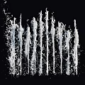Garden Ornament With Slim Nozzles Splashing Water Streams On Black Background