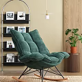 Green Velvet Leisure Chair in Modern Interior with Potted Plant and Bookshelf