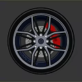 Sporty Car Wheel Design With Red Brake Caliper And Performance Tire