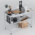 Stainless Steel Kitchen Cart Featuring Kitchenware Fruit Knives Glass Jars Plates Rolling Pin And Basket