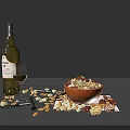 Bowl Of Delicious Mixed Nuts And Chocolate With Wine Bottle And Glasses