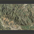 Detailed 3D Mountainous Terrain Model With Lush Green Vegetation And Deep Valleys