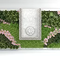 Green Plant Wall With Central Decorative Panel Circular Ornament And Pink Flowers Lush Greenery