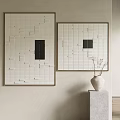 Minimalist Wall Art With Grid Pattern Paintings And White Vase On Pedestal