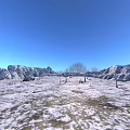 Scenic Winter Landscape With Vast Snowy Field Distant Rocky Mountains Blue Sky Leafless Trees And Bare Ground