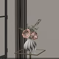 White Striped Vase With Pink Roses And Green Leaves On Gold Metal Table