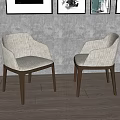Two Light Gray Upholstered Accent Chairs with Armrests and Dark Wooden Legs