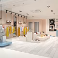 Modern Clothing Store Interior With Mannequins Hanging Garments And Display Shelves