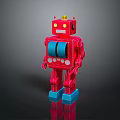 Red Vintage Robot Toy Standing On Black Reflective Surface With Blue Base And Chest Buttons