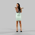 Woman In Patterned Sleeveless Top And Light Green Skirt Posing With Open Hands