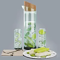Refreshing Summer Drink in Glass Bottle with Cucumber Mint Lime and Ice Cubes