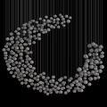 Golden Chandelier with Small Crystal Beads Arranged in Moon Shaped Design Against Black Background