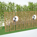 Wooden Partition With Circular Cutouts And Bamboo Plants In Garden