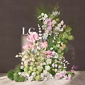 Tall Artistic Floral Display With Pink White Blooms Lush Green Foliage And Elegant Design