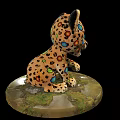 Cheetah Cub Doll with Colorful Patterns Big Blue Eyes Sitting on Decorative Base