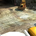 Swing Door Installation At Construction Site With Bulldozer And Yellow Equipment