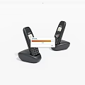 Two Black Cordless Digital Phones With Charging Dock And Screen 3d model