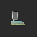 Colorful Stacked Books With Easel And Blank Board On Dark Background