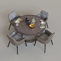 Modern Minimalist Round Wooden Dining Table Set With Four Light Gray Chairs And Decorative Tableware