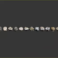 Natural Stone Pebbles In Various Colors And Shapes Arranged On Black Background