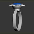 Intricately Sculpted Silver Ring With Blue Gemstone And Decorative Band Carvings