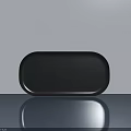 Modern Dark Blue Oval Shaped Bathtub on Shiny Floor with Light Background