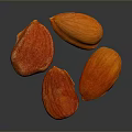 Four Fresh Red and Orange Textured Almonds on Dark Background