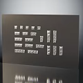Multiple Sleek Modern Silver Switch Panels On Dark Background Display Design