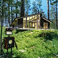 Modern Detached House in Forest with Large Windows and Grassland Surroundings