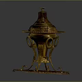 Golden Ornate Household Item With Curved Base Lid And Decorative Designs
