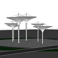Colorful Umbrella Shaped Outdoor Structures With Supporting Pillars And Blue Sky