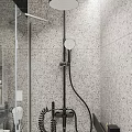 Modern Bathroom Interior Design With Black Tiled Walls Glass Shower White Toilet And Wooden Cabinets