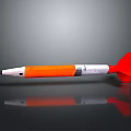 Military Missile With Orange White Body Red Tail Fins And Sharp Nose Design