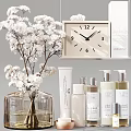 Elegant Perfume Cosmetics Display With White Flower Bouquet Clear Glass Vase And Skincare Bottles
