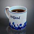 Decorative Holland Themed Ceramic Mug Featuring Blue Tulips And Coffee Inside