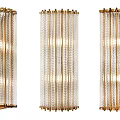 Elegant Gold Frame Wall Sconces With Transparent Glass Rods And Illuminated Design