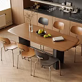 Modern Wooden Dining Table and Chairs Set with Fruit Bowl Vase and Book in Kitchen