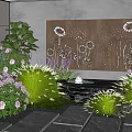 Beautiful Garden Display With Colorful Flowers Green Plants Decorative Wall And Water Feature