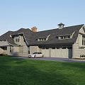 Detached House Exterior With Green Lawn Curved Gravel Driveway And Swimming Pool