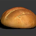Fresh Golden Crusty Bread With Sliced Patterns On Black Background