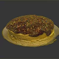 Delicious Layered Cake With Chocolate Glaze And Colorful Sprinkles On Paper Plate