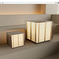 Modern Geometric Table Lamps With Striped Shade And Warm Light On Minimalist Steps