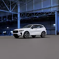 White Volvo SUV With Modern Design And Black Wheels In Spacious Industrial Hall