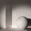 Modern White Textured Floor Tiles In Interior With Matching Wall Design And Spherical Decor