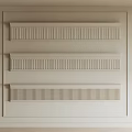 Three Different Gypsum Molding Designs Showcased On Light Colored Wall For Interior Decoration