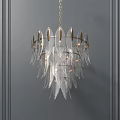 Elegant Feather Shaped Chandelier with Transparent Blades Golden Metal Frame Illuminated on Grey Wall Background